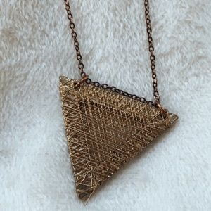Gold toned triangle necklace